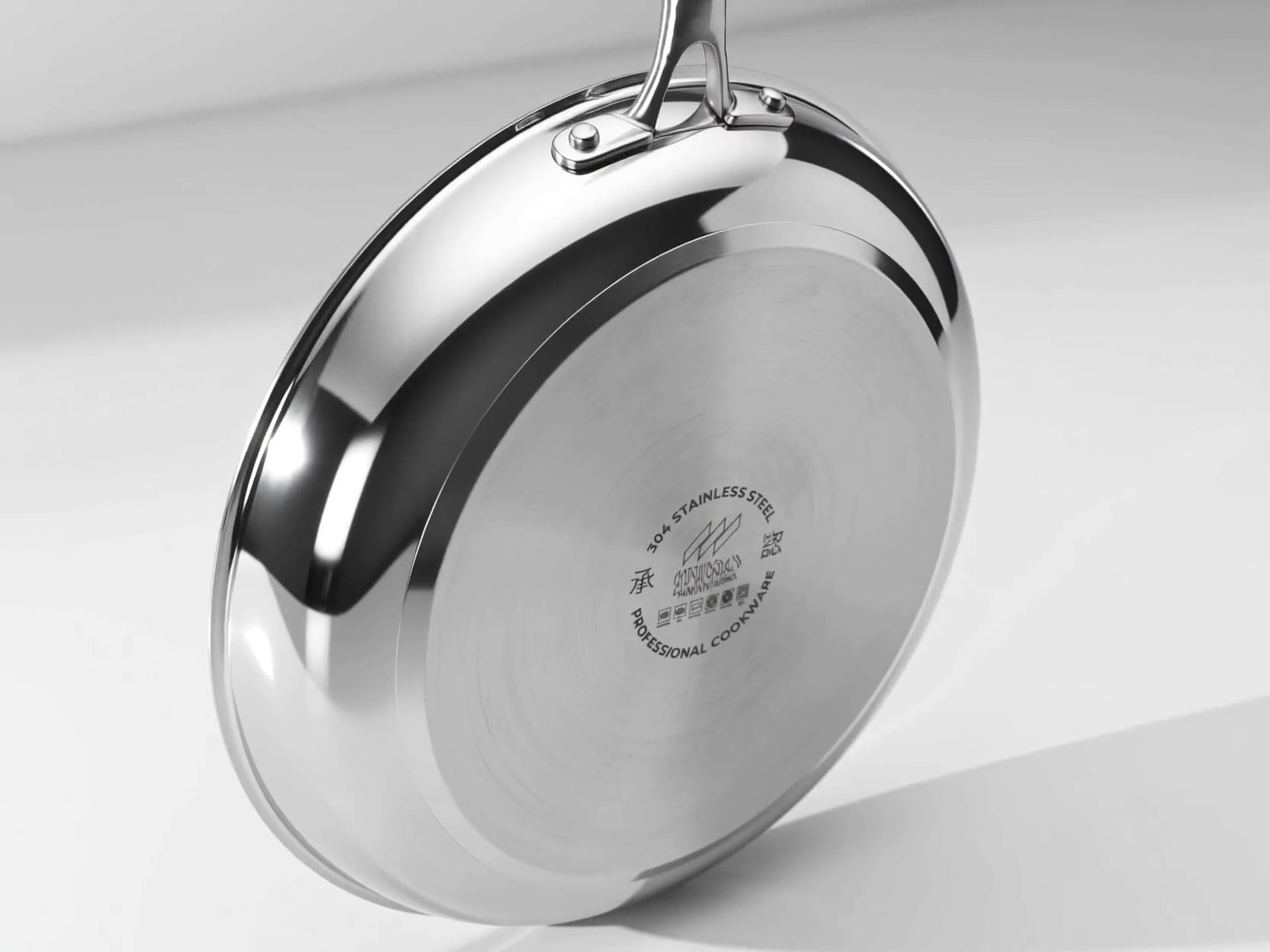Machined base of a SEIDO stainless steel skillet, 304 stainless steel with the engraved seal